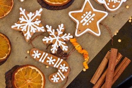 cooking and decorating christmas  cookies and orange slices