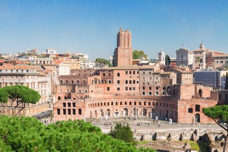 Forum - Roman ruins with cityscape of  Rome at sunny day, Italyの写真素材