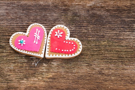 Valentines day heart cookies on wooden backgroundの写真素材
