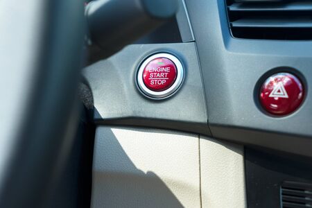 Start engine button on modern car dashboard