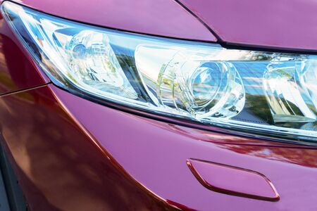 view of red car headlights close upの写真素材