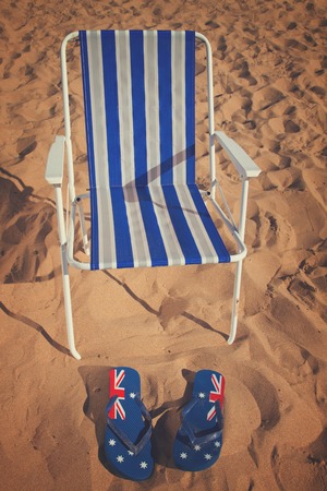 summer beach chair on sea shore in summer sunny day, retro tonedの写真素材