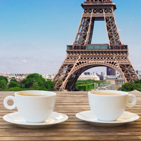 two cups of coffee in Paris cafe with view of Eiffel Towerの写真素材