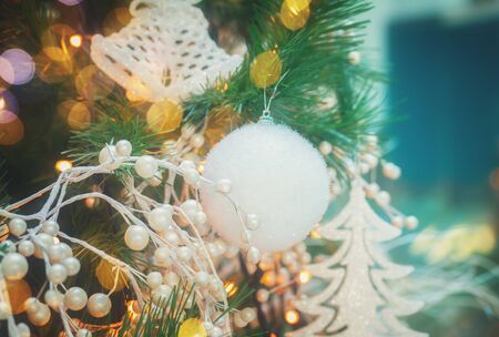 christmas tree with holiday decorations and lights, retro tonedの写真素材