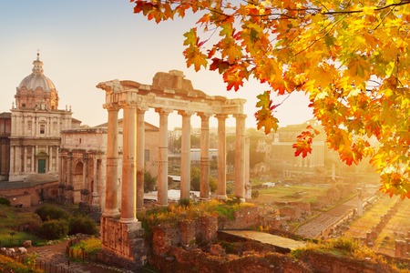 Forum - Roman ruins with cityscape of Rome with sunrire light at fall day, Italyの写真素材