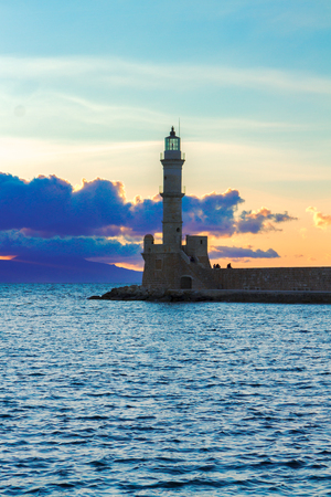 lighthouse of Chania with Aegan sea at sunset, Crete, Greeceの写真素材