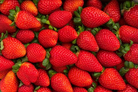 Fresh ripe of red straberries berries backgroundの写真素材