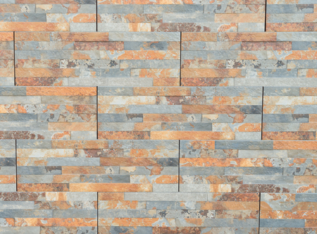 surface of gray and beige textured brick wall background