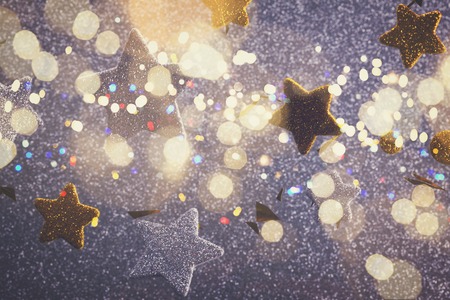 Silver and golden christmas stars festive background, retro tonedの写真素材