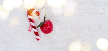 Christmas flat lay styled scene with decorations and copy space on white aged table bannerの写真素材
