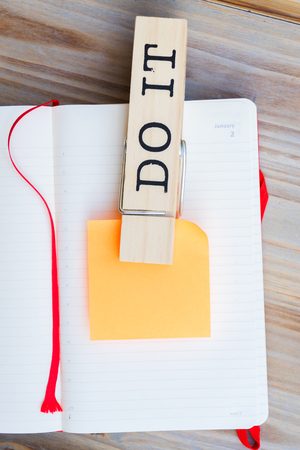 To do list - open netebook with paper sticky noteの写真素材