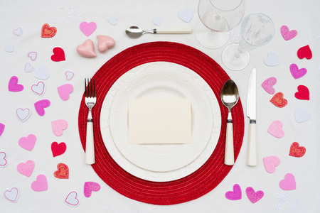 Set of tableware for Valentines Dinner with hearts, top viewの写真素材