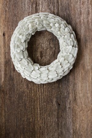 Easter fresh catkins wreath on wooden background with copy spaceの写真素材