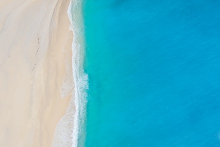 Beautiful clear deep water and white beach background of Zakinthos island, Greeceの写真素材