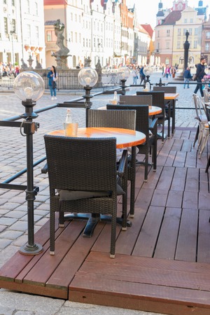 view of romantic street cafe at market square, Poznan Polandの写真素材