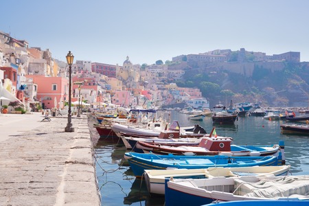 Procida island colorful town with embankment at summer, Italyの写真素材