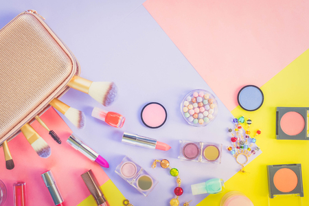 Colorful make up products material design flat lay scene with copy space, retro tonedの写真素材