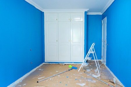 home renovation concept - old flat during restoration or refurbishment with newly painted blue wallsの写真素材