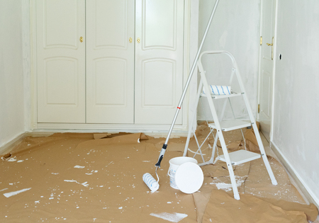 home renovation concept - old apartment during restoration or refurbishment with white plaster wallsの写真素材