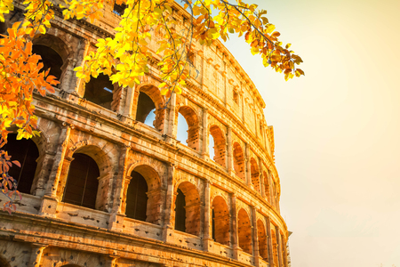 ruins of Colosseum at sunrise light in Rome, Italy at fallの写真素材
