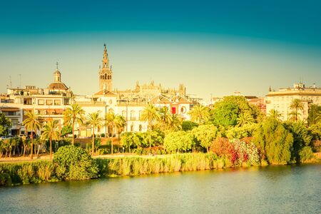 cityscape of Sevilla on river Guadalquivir, Spain, toned
