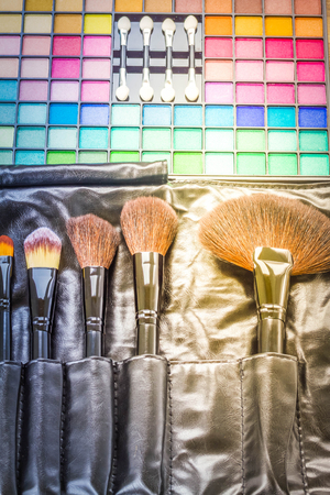 Set of black brushes with eye shadows, retro tonedの写真素材