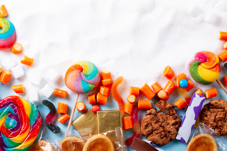 Sweets and candies with sugar, flat lay scene with copy spaceの写真素材