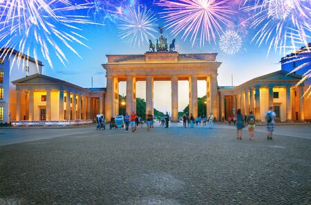 Brandenburg gate at night with fireworks, Berlin, Germanyの写真素材