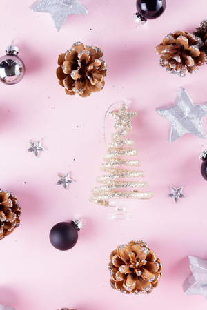 Christmas tree with cones on pinkの写真素材