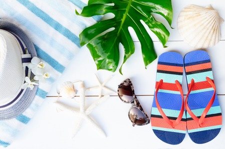 Summer flat lay scenery with flip flops, top viewの写真素材