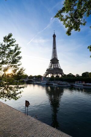 Paris Eiffel Tower and river Seine at sunrise in Paris, France.