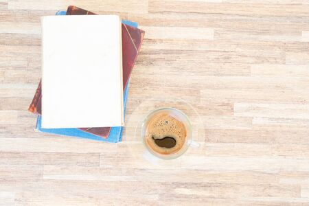 Stack of old books on wooden  with copy spaceの写真素材