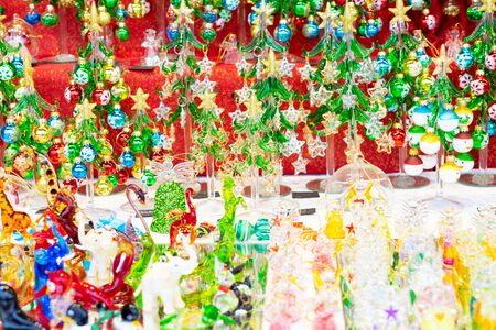 Christmas market kiosk details with glass christmas tree decorationsの写真素材