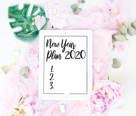 Creative New 2020 year planner composition mock up, pink blanket, flowers on whiteの写真素材