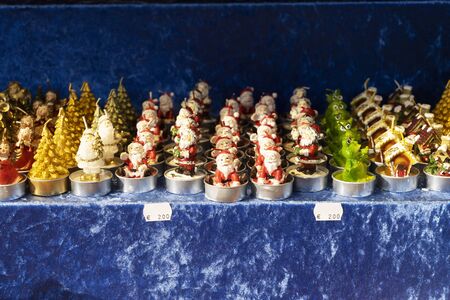 Christmas market kiosk details with christmas tree bright candlesの写真素材