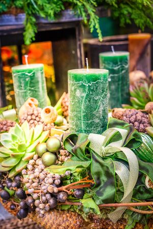Decorated advent candles wreath with succelemt natural green decorations, tonedの写真素材