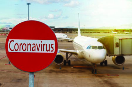 flight cancelation because of coronavirus concept, empty plane in backgroundの写真素材