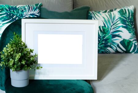 Interior poster mock up with horizontal frame and plants in vase in living room close up