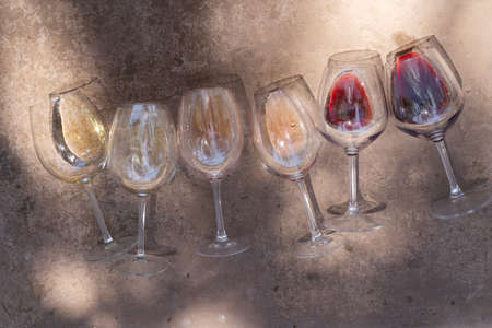 pink, white and red wine in glassesの写真素材