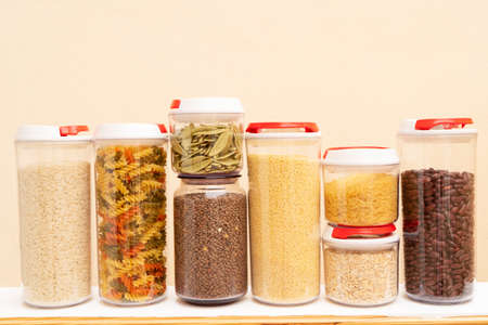 Food storage - raw food ingredients inside transparent jarsの写真素材