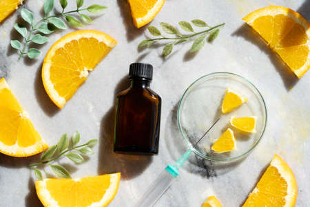 Citrus fruit vitamin c serum oil beauty care, anti aging natural cosmetic, laboratory testing conceptの写真素材