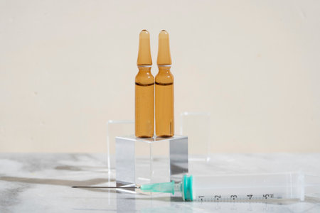 serum oil beauty care, anti aging natural cosmetic, laboratory testing concept, display products podium on neutral beige backgroundの写真素材