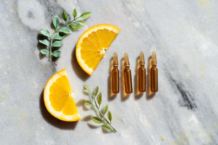 Citrus fruit vitamin c serum oil beauty care, anti aging natural cosmetic, laboratory testing conceptの写真素材