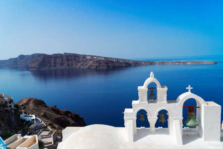 white belfry, Santorini island, Greeceの写真素材