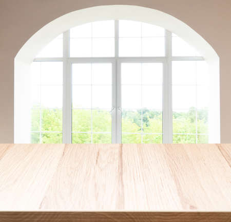 wooden produtc display with the window in backgroundの写真素材