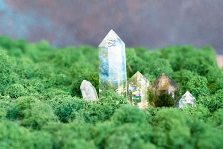 gemstones minerals on mysterious natural forest moss background, quartz and calcite crystals close up. Magic healing Rock for Reiki Crystal Ritual, Witchcraft, spiritual esoteric practiceの写真素材