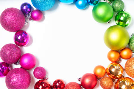Colorful christmas lifestyle - frame of multicolored rainbow christmas decorationsの写真素材