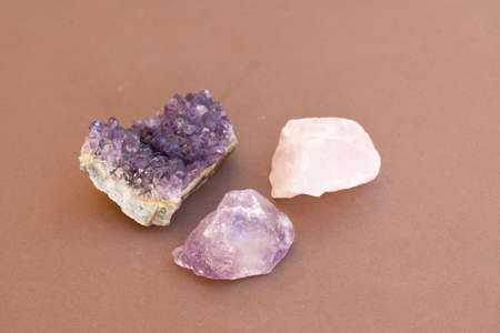 Natural healing crystals on brown background