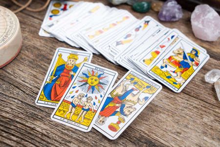 Fortune telling on tarot cards lifestyle, used Marseille Tarot deck by unknown artist published...