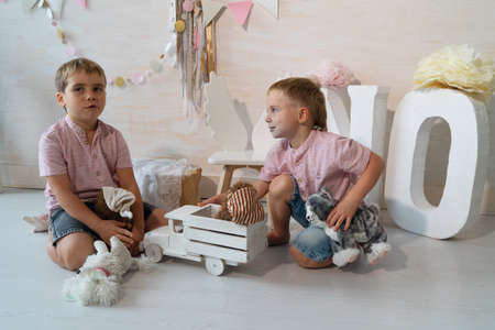 Children playing with toys in the room at homeの写真素材